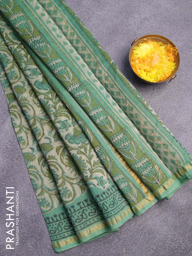 Chanderi bagru saree beige and green with allover floral prints and zari woven piping border