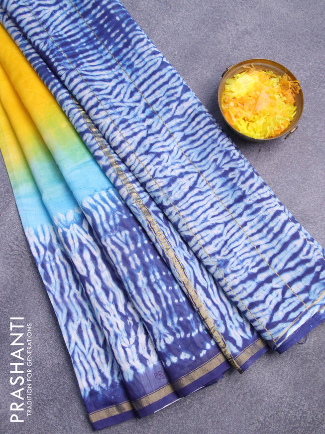 Chanderi bagru saree yellow and blue with shibori prints and zari woven piping border
