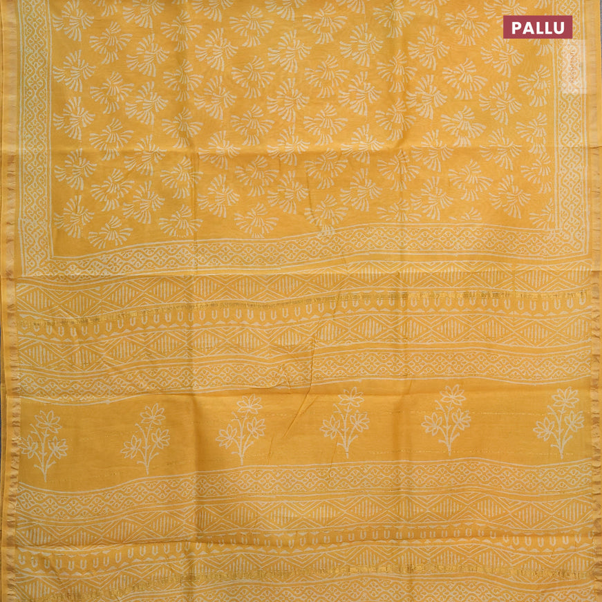 Chanderi bagru saree yellow with allover butta prints and zari woven piping border