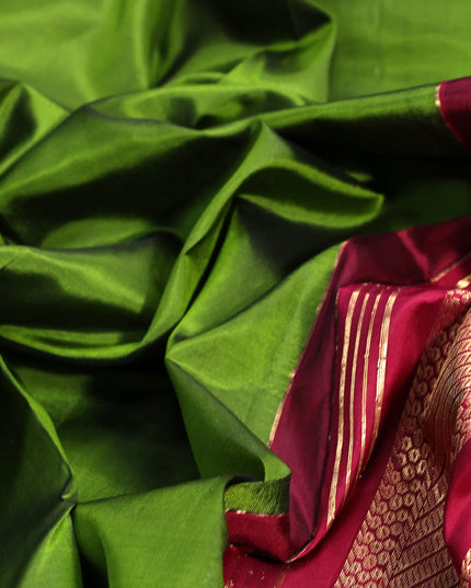10 yards silk saree mehendi green and dark magenta pink with plain body and zari woven border