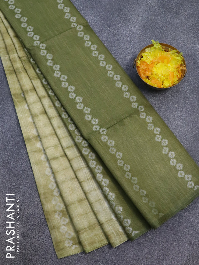 Bamboo silk saree elaichi green and sap green with allover tie & dye prints & geometric thread weaves in borderless style
