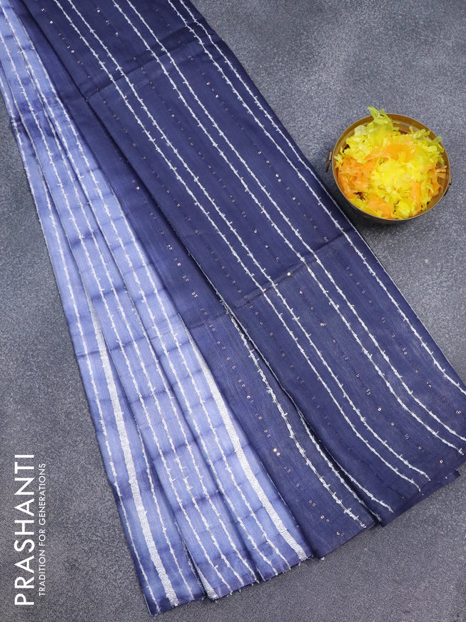 Bamboo silk saree blue shade and navy blue with allover tie & dye prints & thread stripe pattern and sequin work pallu