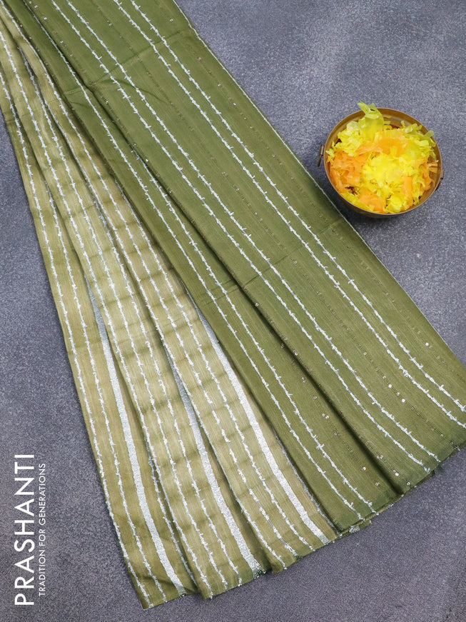 Bamboo silk saree elaichi green and sap green with allover tie & dye prints & thread stripe pattern and sequin work pallu