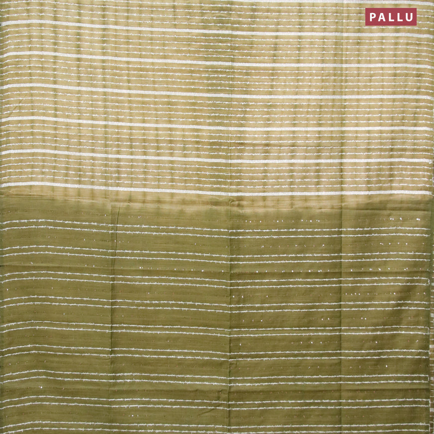 Bamboo silk saree elaichi green and sap green with allover tie & dye prints & thread stripe pattern and sequin work pallu