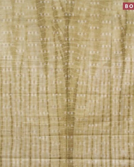 Bamboo silk saree elaichi green with allover tie & dye prints & thread buttas in borderless style