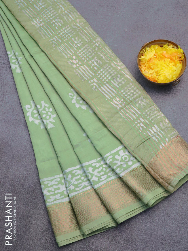 Semi gadwal saree pastel green with batik buttas prints and zari woven border