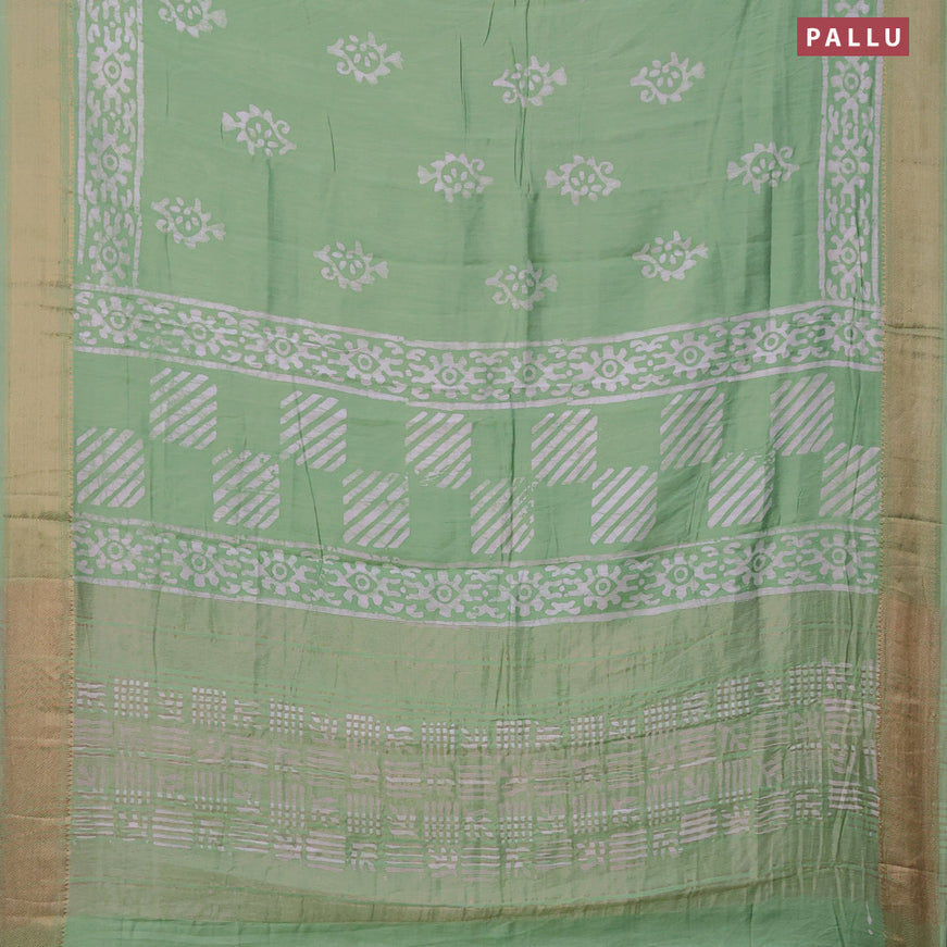 Semi gadwal saree pastel green with batik buttas prints and zari woven border