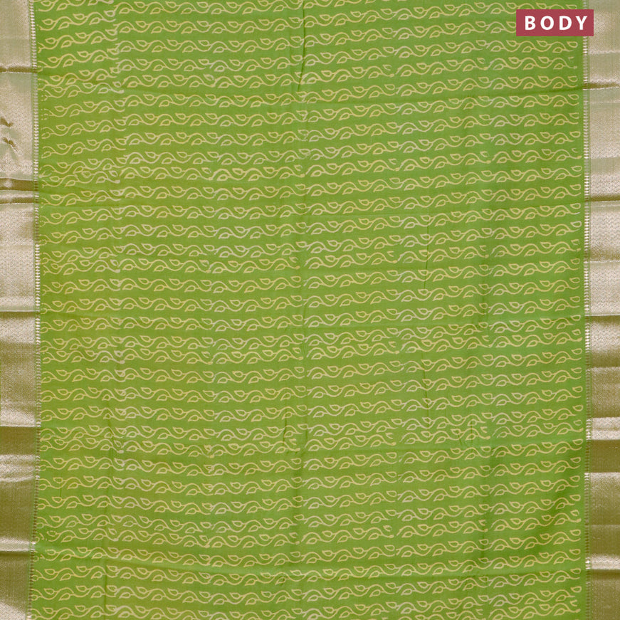 Semi gadwal saree light green with allover prints and zari woven border