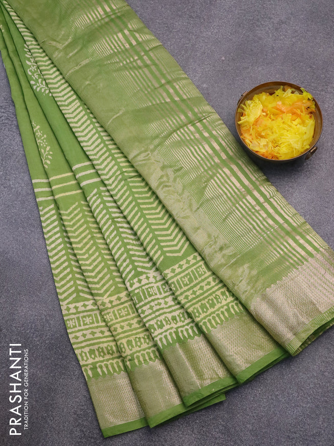 Semi gadwal saree light green with floral prints and zari woven border