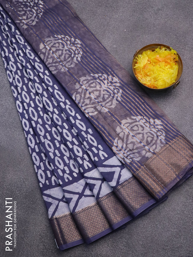 Semi gadwal saree gery with allover batik prints and zari woven border