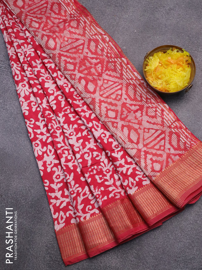 Semi gadwal saree tomato red with allover batik prints and zari woven border
