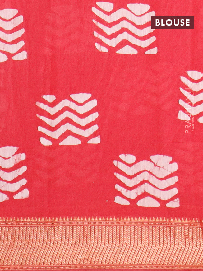 Semi gadwal saree tomato red with allover batik prints and zari woven border