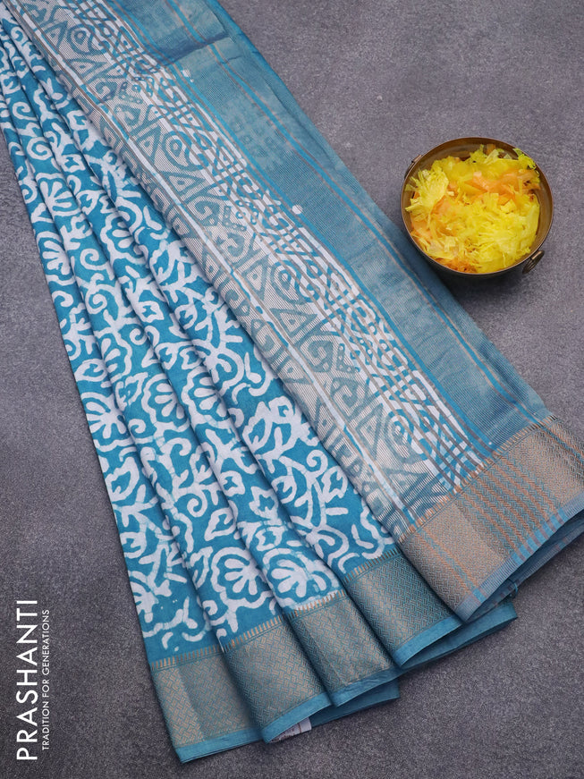 Semi gadwal saree light blue with allover batik prints and zari woven border