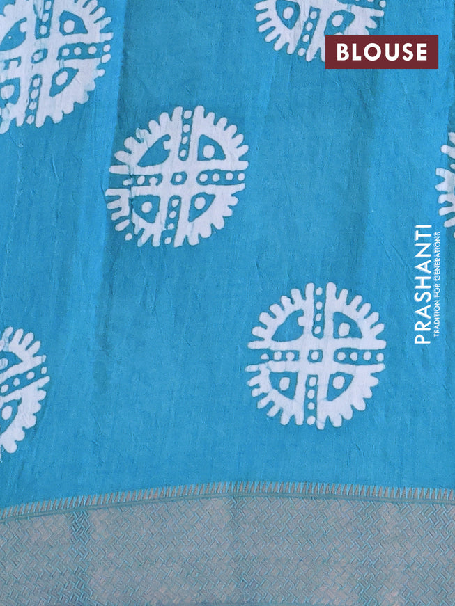 Semi gadwal saree light blue with allover batik prints and zari woven border
