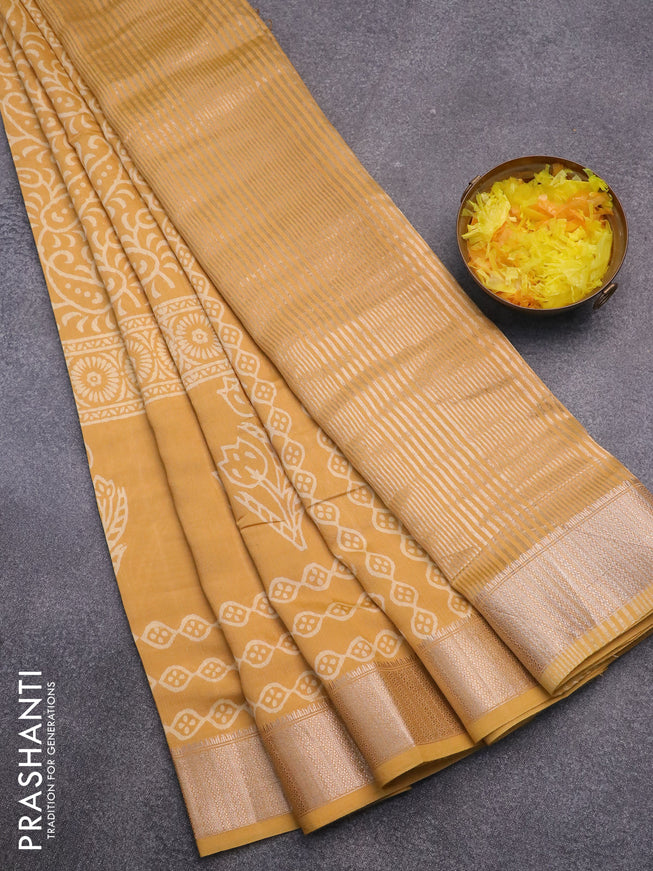 Semi gadwal saree yellow with floral prints and zari woven border