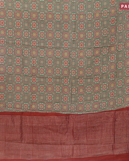 Semi gadwal saree green and maroon shade with allover ajrakh prints and zari woven border