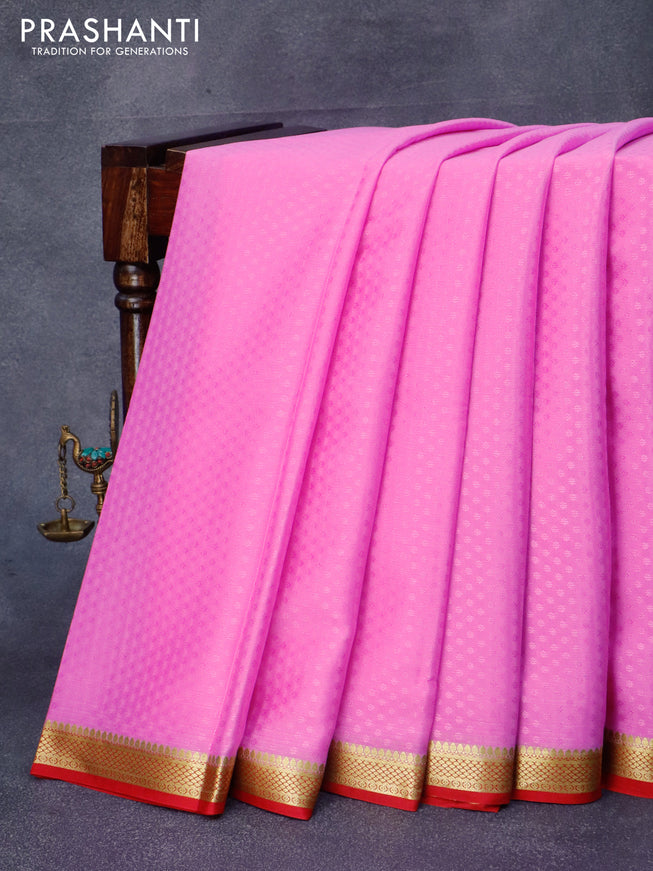 Pure mysore crepe silk saree light pink and red with allover self emboss and zari woven border