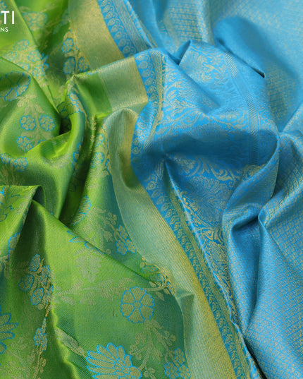 Pure kanjivaram silk saree light gren and blue with allover zari woven floral brocade weaves and rich zari woven border