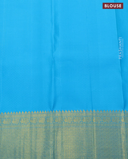 Pure kanjivaram silk saree light gren and blue with allover zari woven floral brocade weaves and rich zari woven border