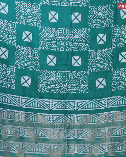 Semi gadwal saree teal green and off white with allover prints and zari woven border