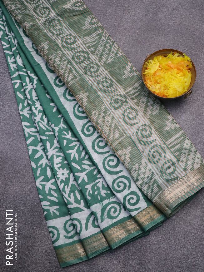 Semi gadwal saree green and off white with allover batik prints and zari woven border