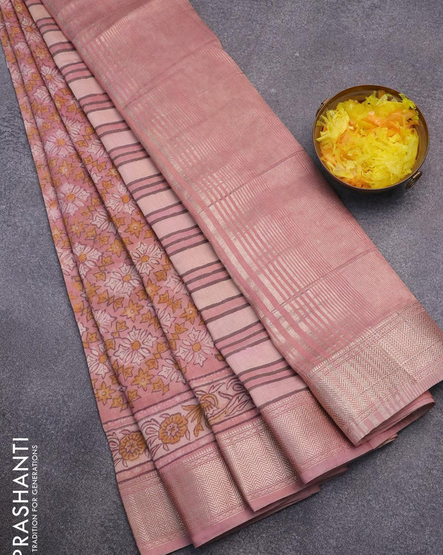 Semi gadwal saree pastel pink with allover floral prints and zari woven border