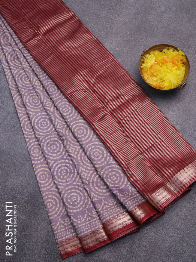 Semi gadwal saree pastel purple and maroon with allover geometric prints and zari woven border