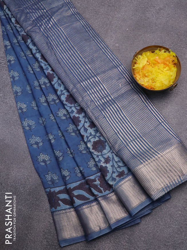 Semi gadwal saree blue with allover floral butta prints and zari woven border