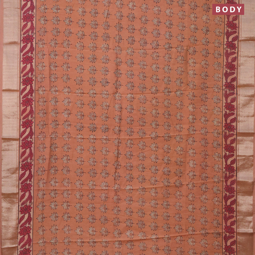 Semi gadwal saree peach orange with allover floral butta prints and zari woven border