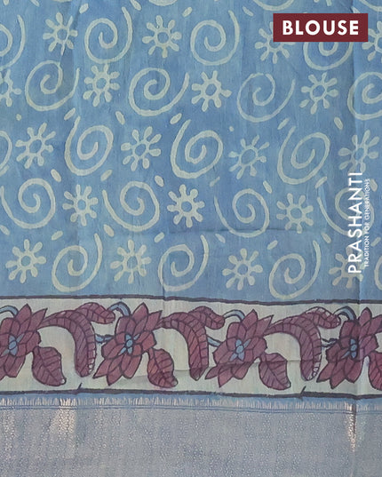 Semi gadwal saree blue shade with allover floral butta prints and zari woven border