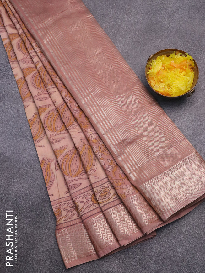 Semi gadwal saree pastel peach with allover prints and zari woven border