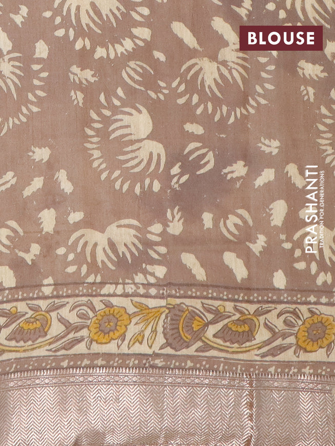 Semi gadwal saree sandal and brown shade with allover prints and zari woven border