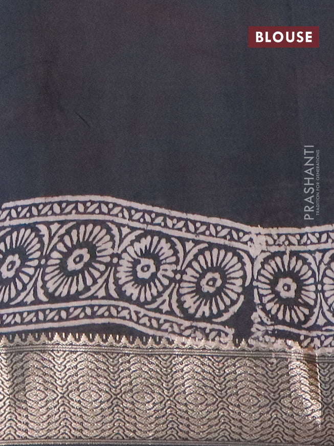 Semi gadwal saree elephant grey with allover prints and zari woven border
