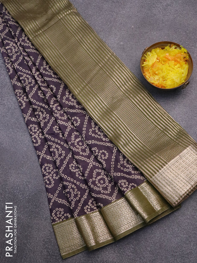Semi gadwal saree deep jamun shade and mehendi green with allover bandhani prints and zari woven border