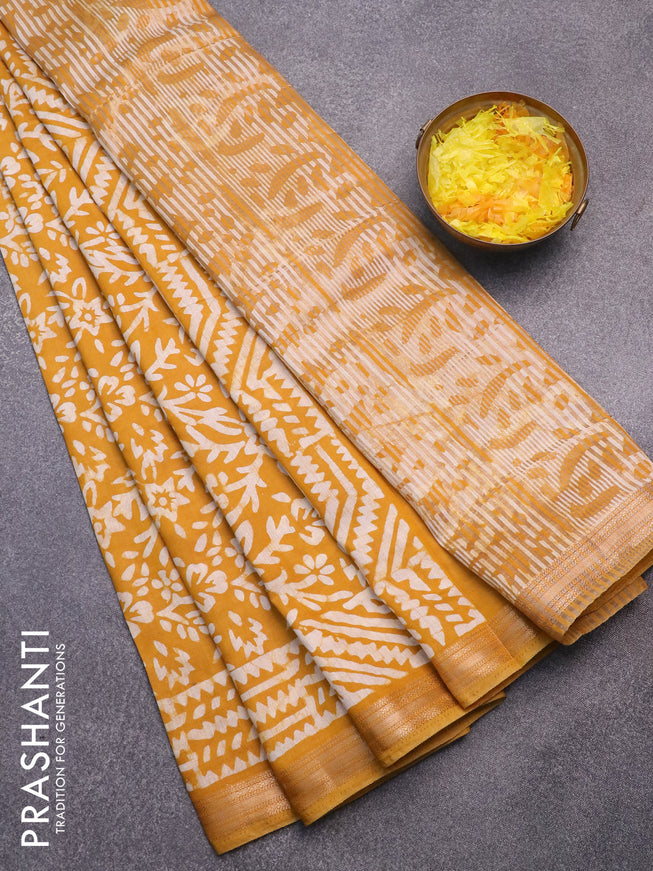 Semi gadwal saree dark mustard with allover batik saree and zari woven border