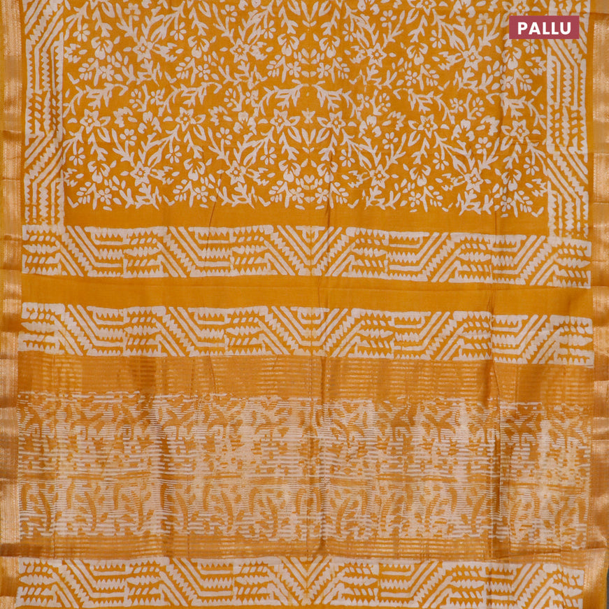 Semi gadwal saree dark mustard with allover batik saree and zari woven border