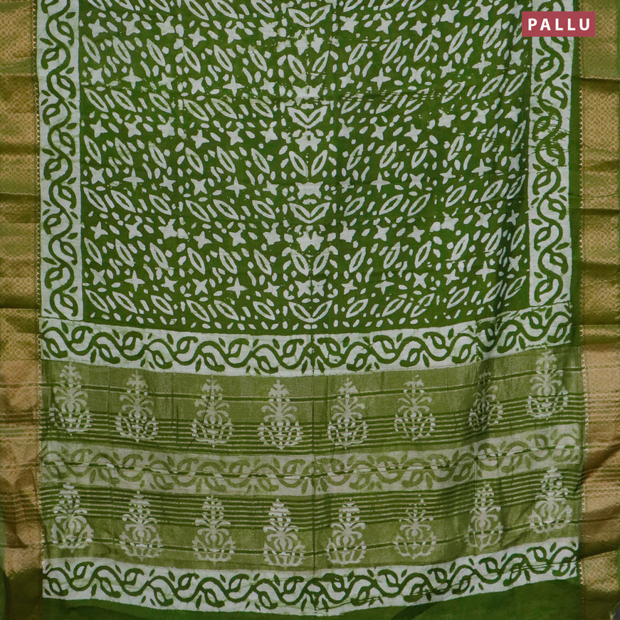 Semi gadwal saree green with allover batik prints and zari woven border