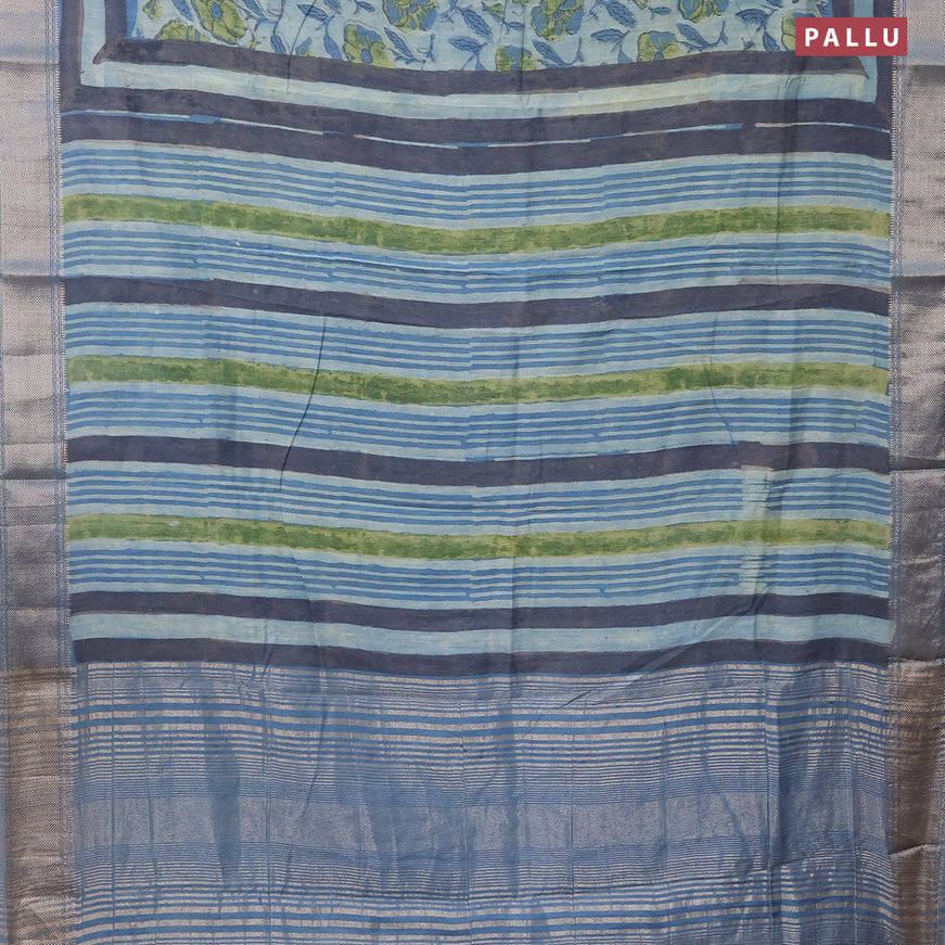 Semi gadwal saree pastel shade of blue with allover floral prints and zari woven border