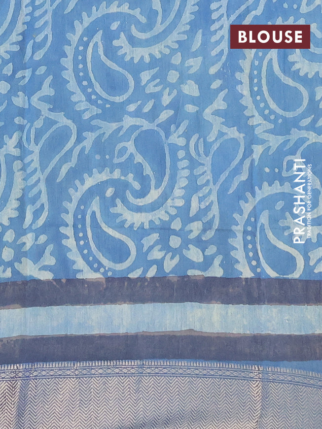 Semi gadwal saree pastel shade of blue with allover floral prints and zari woven border