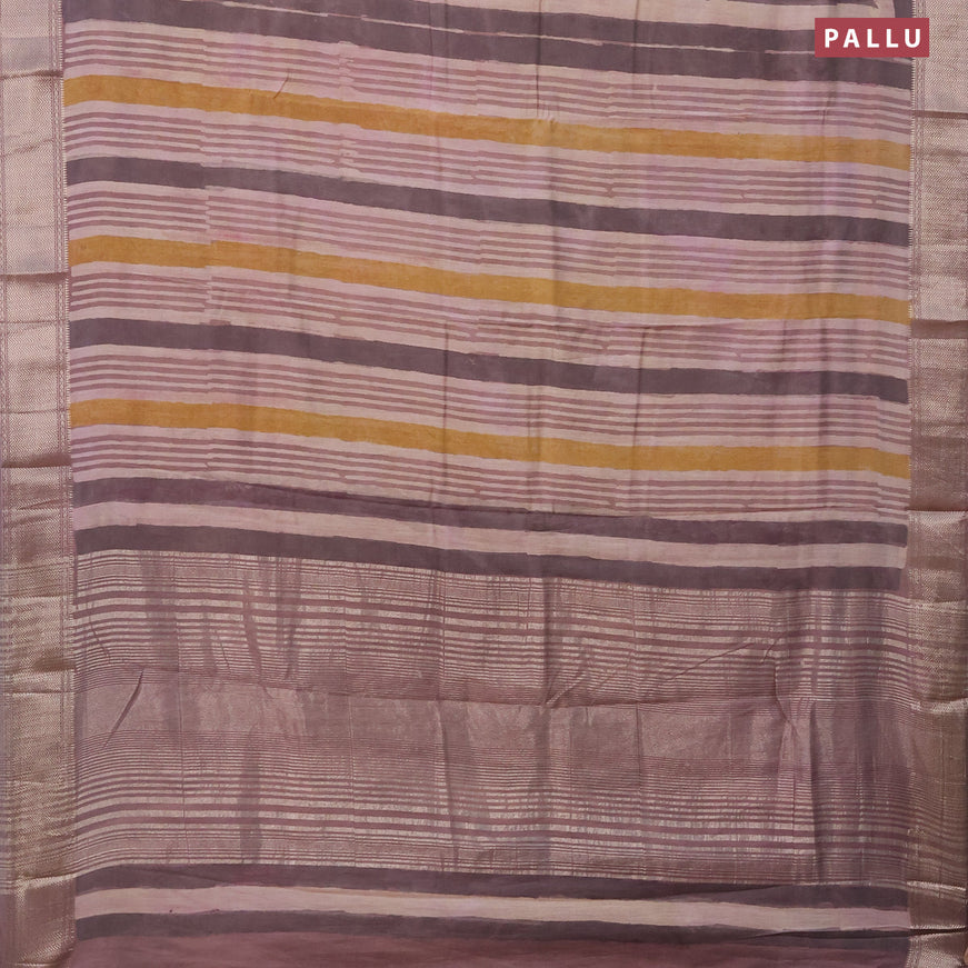 Semi gadwal saree pastel brown shade with allover floral prints and zari woven border