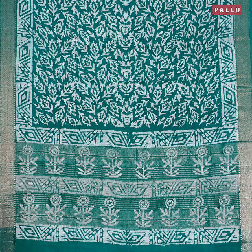 Semi gadwal saree teal green and off white with allover batik prints and zari woven border
