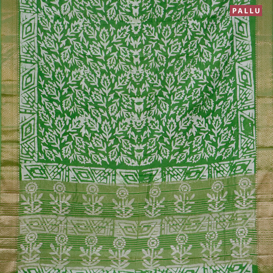 Semi gadwal saree green and off white with allover batik prints and zari woven border