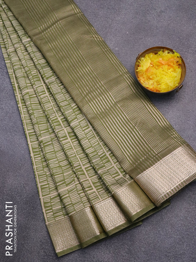 Semi gadwal saree mehendi green and beige with allover geometric prints and zari woven border