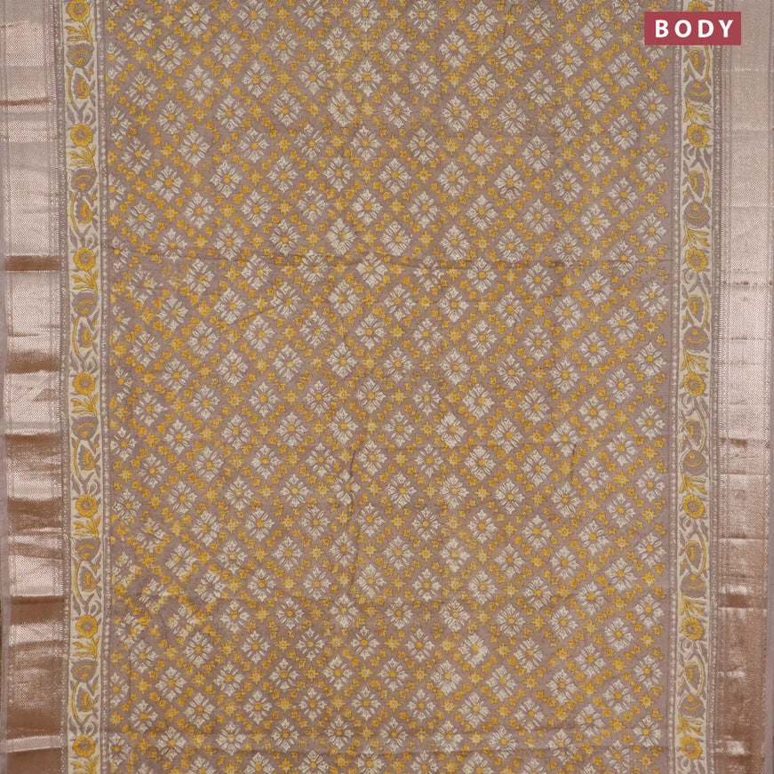 Semi gadwal saree grey shade with allover floral prints and zari woven border