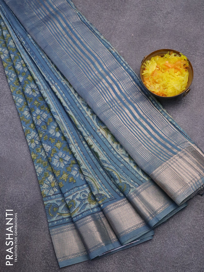 Semi gadwal saree bluish grey with allover floral prints and zari woven border