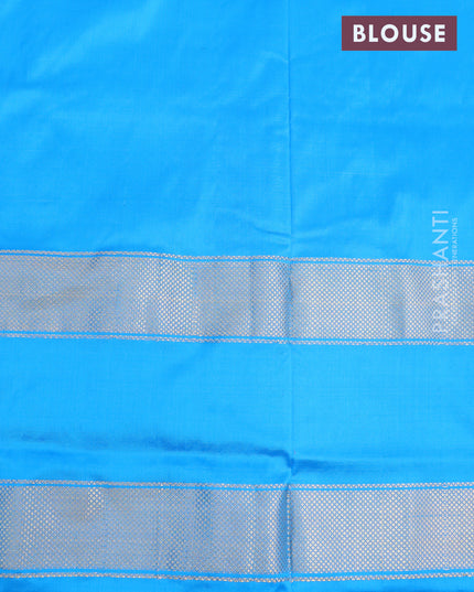 Pochampally silk saree orange and cs blue with allover ikat weaves and long rettapet ikat zari woven border