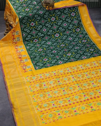 Pochampally silk saree green and yellow with allover ikat weaves and long zari woven border