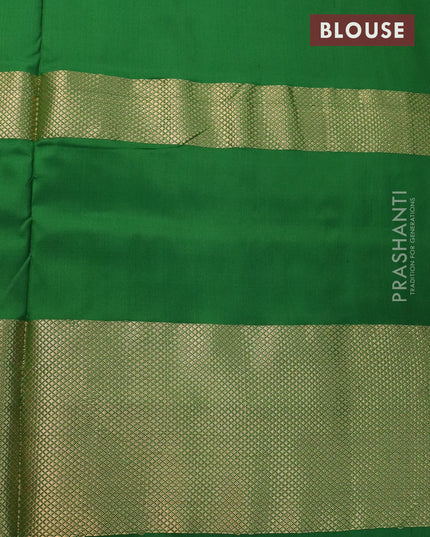 Pochampally silk saree cream and green with allover ikat weaves and long zari woven border