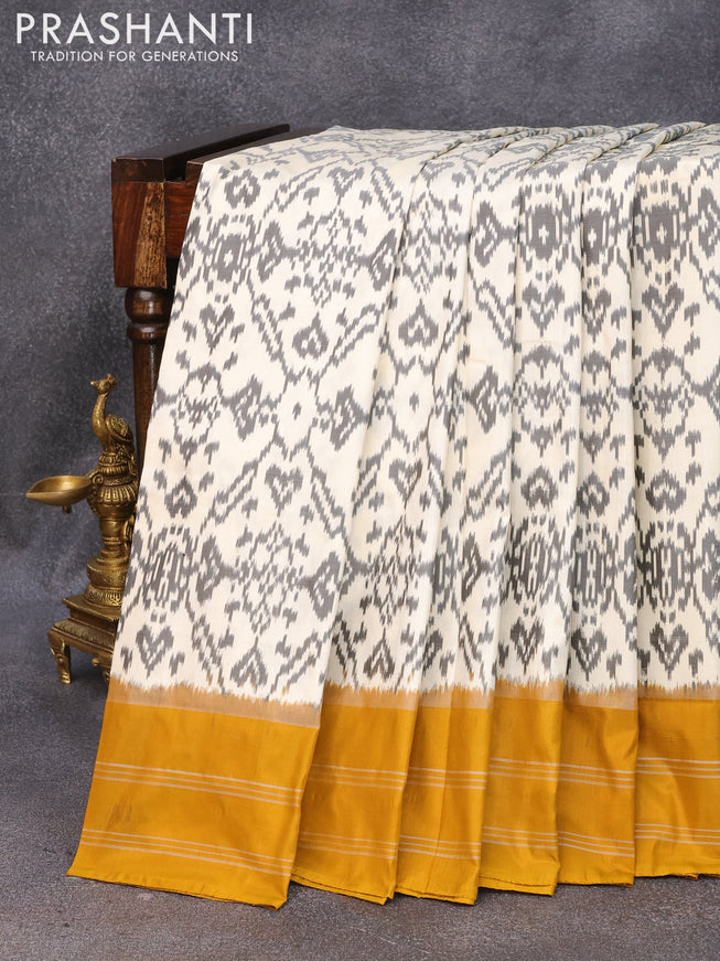 Pochampally silk saree off white and mustard yellow with allover ikat weaves and simple border