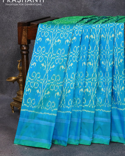 Pochampally silk saree dual shade of cs blue with allover ikat weaves and simple border